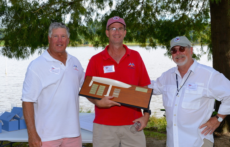 Pictured above is RC Laser NA Class Secretary, Dave Branning on left presenting the Bruce Kirby Trophy to Jim Kaighin with Silver Fleet Winner and Regatta Chairman, Rick Ferguson on the right
